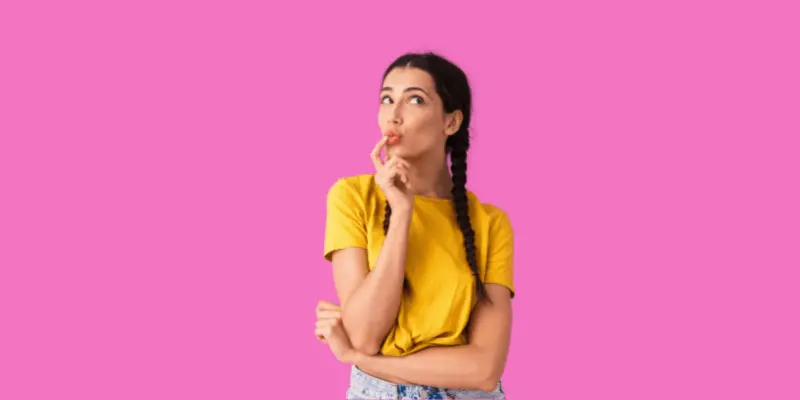 Woman in thinking pose—Should I Date Someone Who Isn't Over Their Ex