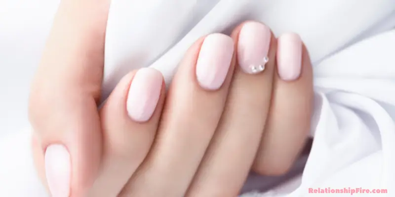 Natural palette nail polish on fingers