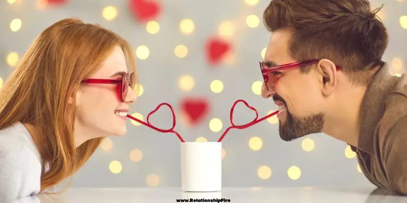 Man and woman drinking straws from the same cup—What to get a Cancer Man for Valentine's Day