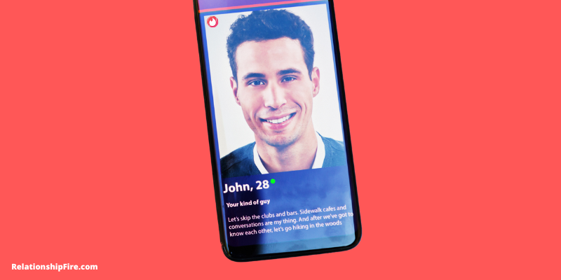 Dating app on phone with man's profile - What does the green dot mean on Tinder