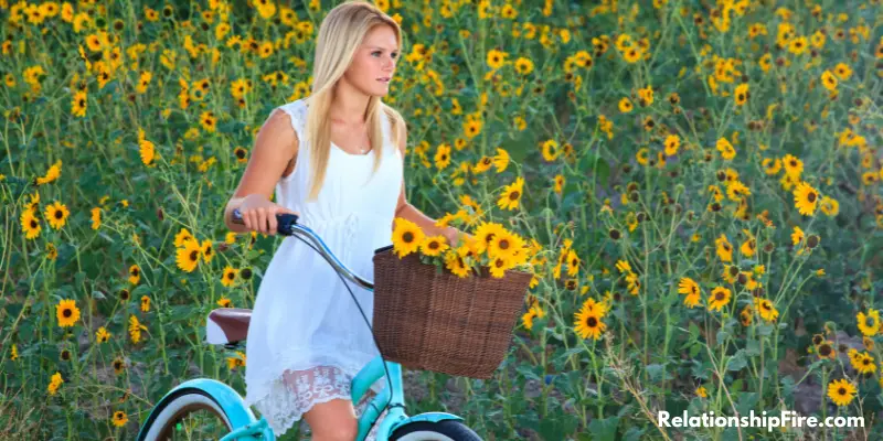 Woman in a sundress riding a bike - Why Do Guys Like Sundresses